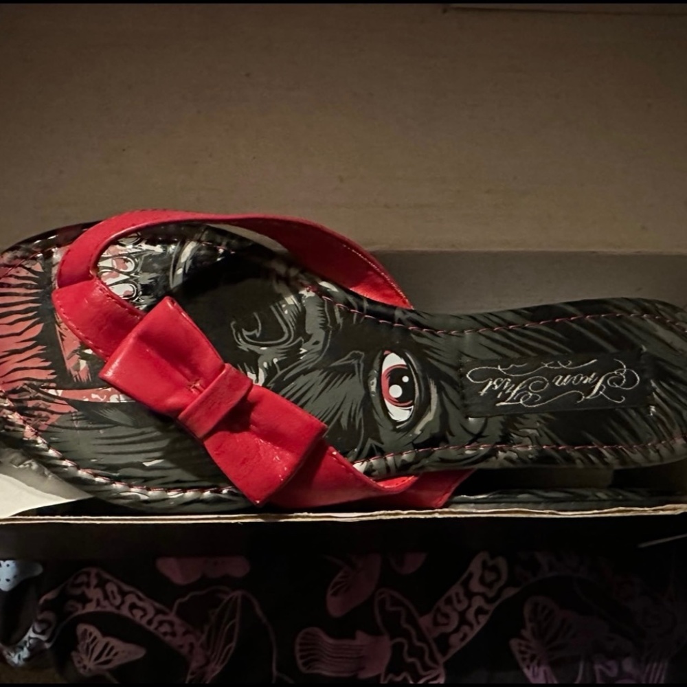 Iron fist flip flops